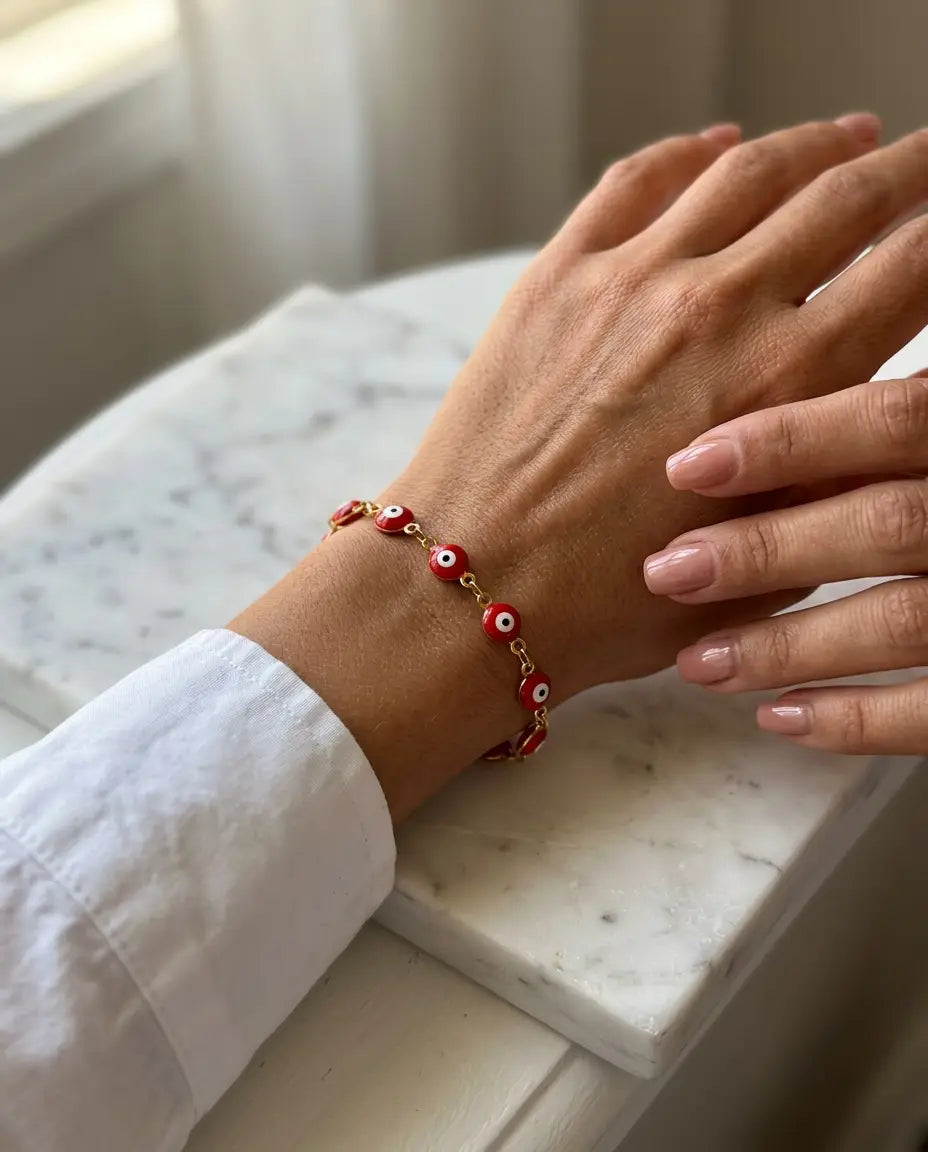PULSERA OJITO ROJO