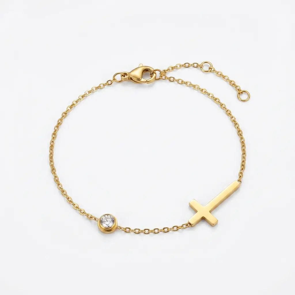 PULSERA CRUZ ZIRC DORADA