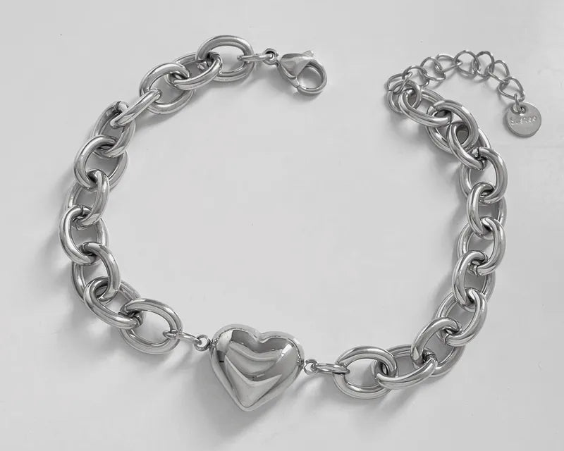 PULSERA CON CORAZON PLATEADO