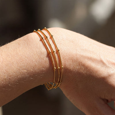 PULSERA TRIPLE BOLITA