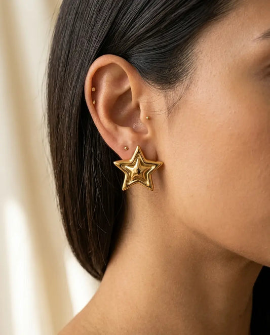 ARETE DOBLE ESTRELLA DORADA