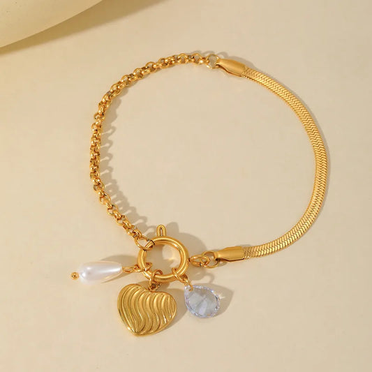 PULSERA DE CHARMS PERLA Y CORAZON