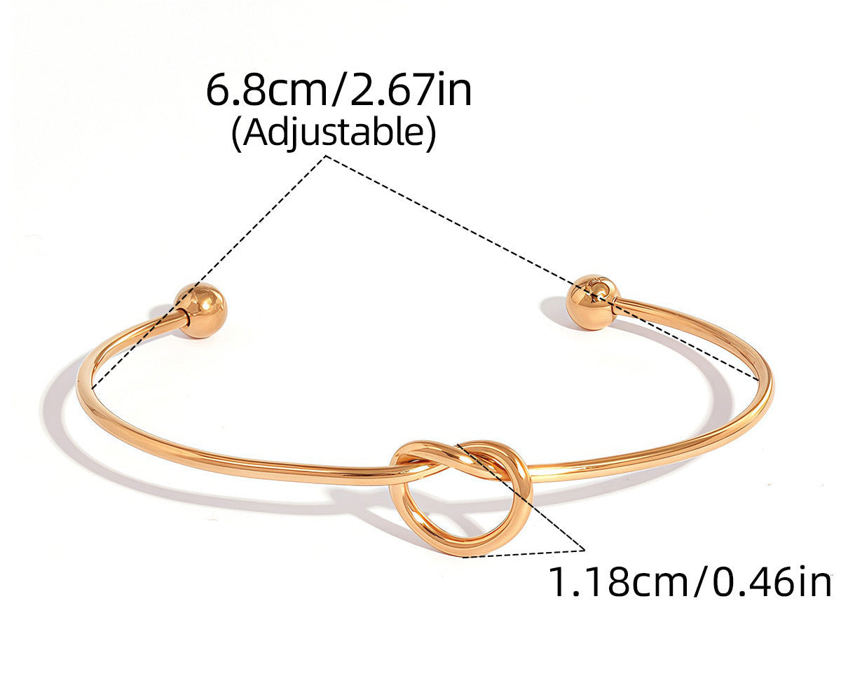 BRAZALETE NUDO GLOBO DORADO