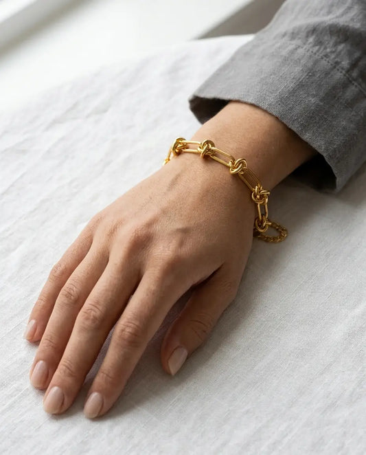 PULSERA NUDOS DORADA
