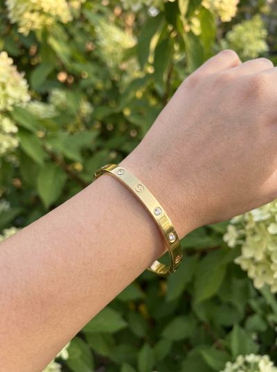 BRAZALETE ACERO CON ZIRCONIA DORADO